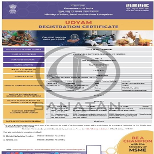 man wearing a black jacket, white shirt, blue jeans, and brown boots, playing a white electric guitar while sitting on an amp