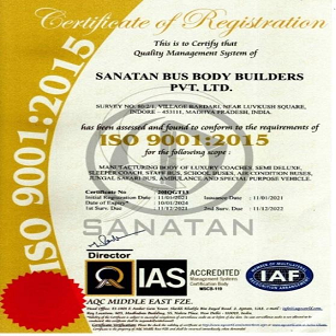 back view of woman wearing a backpack and beanie waiting to cross the road on a busy street at night in New York City, USA