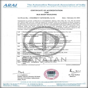 car interior from central back seat position showing driver and blurred view through windscreen of a busy road at night
